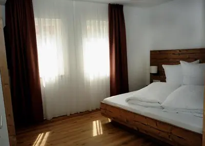 Ein Bett oder Betten in einem Zimmer der Unterkunft Gästehäusle in Mundelsheim