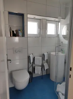 Ein Badezimmer in der Unterkunft FeWo Sartorius am Hemsberg