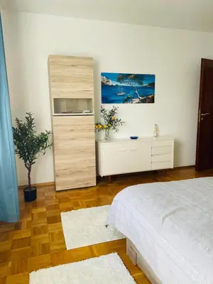 Ein Bett oder Betten in einem Zimmer der Unterkunft Ferienwohnung Bella