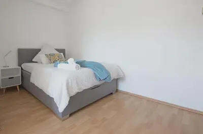 Ein Bett oder Betten in einem Zimmer der Unterkunft Western