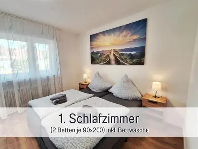 Ein Bett oder Betten in einem Zimmer der Unterkunft Germersheimer Rhein-Quartier