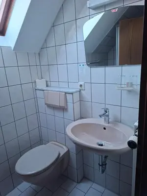 Ein Badezimmer in der Unterkunft Gästezimmer Hagenschieß
