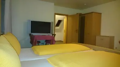 Ein Bett oder Betten in einem Zimmer der Unterkunft Schozacher Stüble