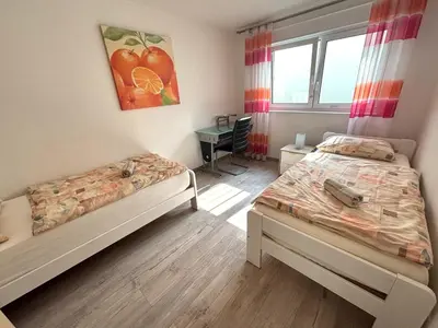 Ein Bett oder Betten in einem Zimmer der Unterkunft Unterkunft im Untergeschoss Platz für bis zu 4 Personen