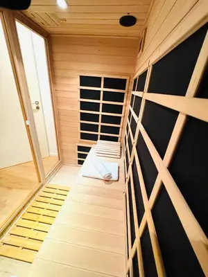 Ein Bett oder Betten in einem Zimmer der Unterkunft NIRO I Design City Apartment, Wellness, Infrarotkabine, Parkplatz, TV