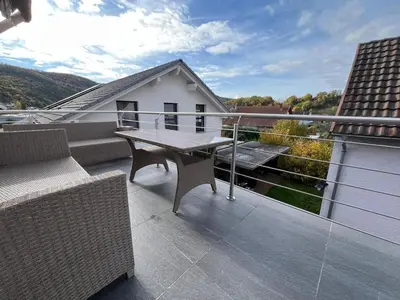 Ein Balkon oder eine Terrasse in der Unterkunft Traumhafte 3 Zimmer Ferienwohnung mit Balkon