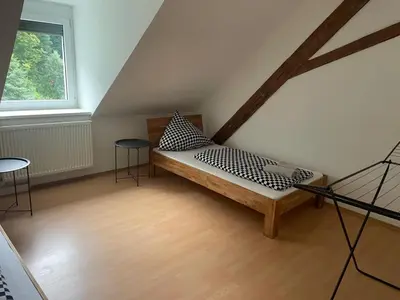 Ein Bett oder Betten in einem Zimmer der Unterkunft Haus Giebelwald