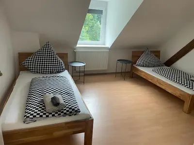 Ein Bett oder Betten in einem Zimmer der Unterkunft Haus Giebelwald