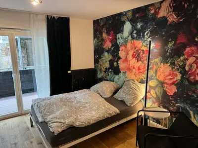 Ein Bett oder Betten in einem Zimmer der Unterkunft Apartment am Nationaltheater