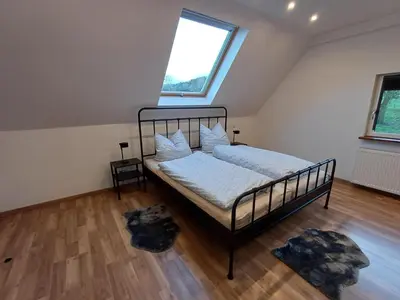 Ein Bett oder Betten in einem Zimmer der Unterkunft Ferienwohnung Beim Schorsch
