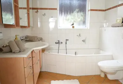 Ein Badezimmer in der Unterkunft Ferienwohnung Ferienhaus Wörrstadt