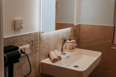 Ein Badezimmer in der Unterkunft Batu Apartment