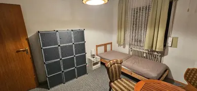 Ein Sitzbereich in der Unterkunft Zentralgelegene Wohnung im EG