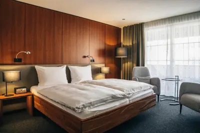 Ein Bett oder Betten in einem Zimmer der Unterkunft Consulat des Weins