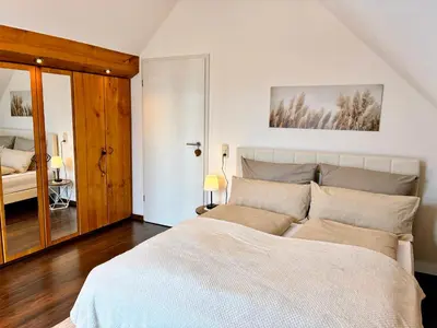 Ein Bett oder Betten in einem Zimmer der Unterkunft Ferienwohnung Spessartzeit - ruhig & naturnah im Spessart
