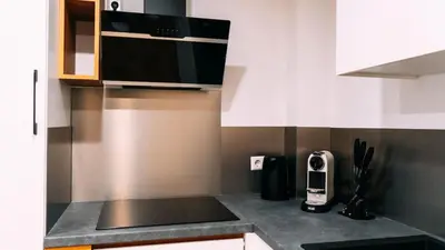 Küche/Küchenzeile in der Unterkunft Calm Belt Cozy Apartment im Herzen von Durlach