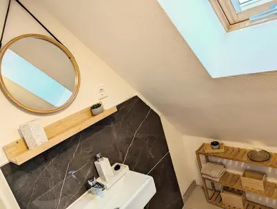 Ein Badezimmer in der Unterkunft Ferienhaus am Gässchen