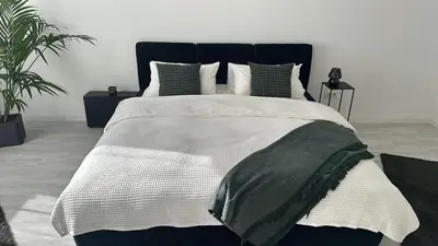 Ein Bett oder Betten in einem Zimmer der Unterkunft Good Vibes Luxury Homes