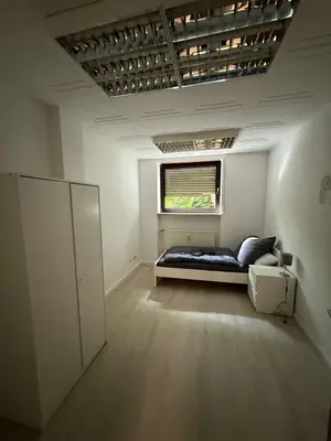 Ein Sitzbereich in der Unterkunft RO1 - Gepflegte Unterkunft Nahe Frankfurt