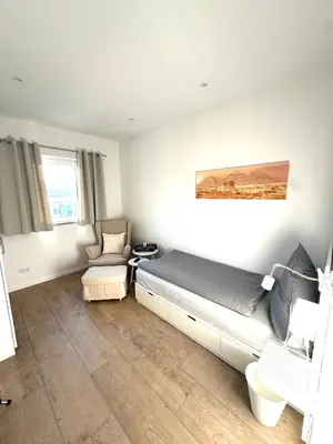 Ein Bett oder Betten in einem Zimmer der Unterkunft B3 Boardinghouse bei Becker