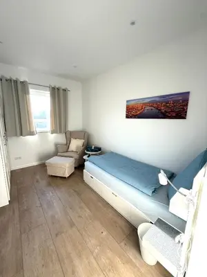 Ein Bett oder Betten in einem Zimmer der Unterkunft B3 Boardinghouse bei Becker