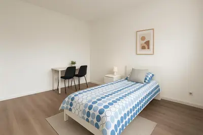Ein Bett oder Betten in einem Zimmer der Unterkunft Monteur- und Ferienwohnung Viernheim
