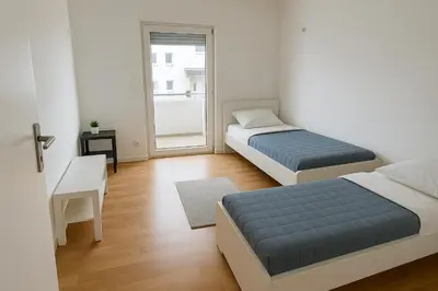 Ein Bett oder Betten in einem Zimmer der Unterkunft Monteur- und Ferienwohnung Bensheim