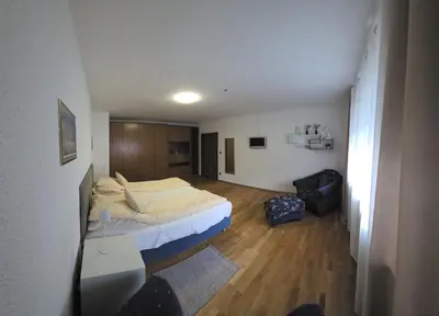 Ein Bett oder Betten in einem Zimmer der Unterkunft ALESIA Ferienwohnung Südpfalz