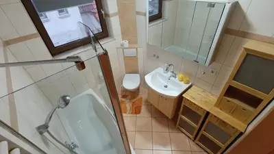 Ein Badezimmer in der Unterkunft Ferienwohnung am Lachendeich