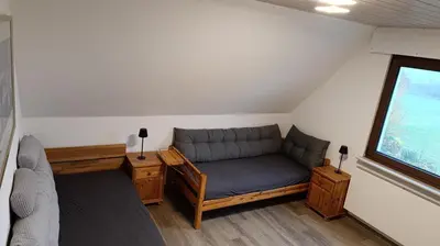 Ein Sitzbereich in der Unterkunft Ferienwohnung am Lachendeich