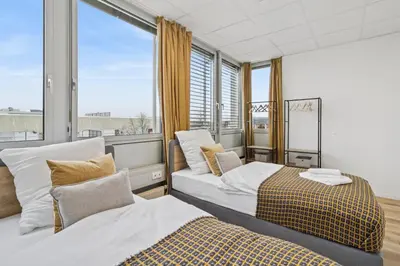 Ein Bett oder Betten in einem Zimmer der Unterkunft Urban Havn - 6 Apartments mit top Anbindung für bis zu 34 Personen