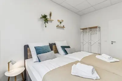 Ein Bett oder Betten in einem Zimmer der Unterkunft Urban Havn - 6 Apartments mit top Anbindung für bis zu 34 Personen