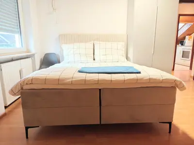 Ein Bett oder Betten in einem Zimmer der Unterkunft Karlsbader35