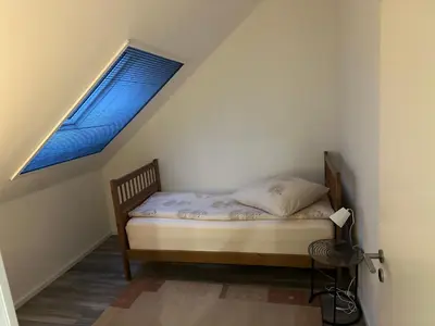 Ein Bett oder Betten in einem Zimmer der Unterkunft Ferienwohnung Steinberg