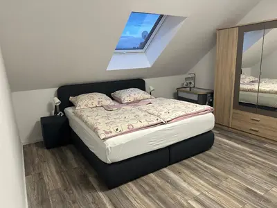 Ein Bett oder Betten in einem Zimmer der Unterkunft Ferienwohnung Steinberg