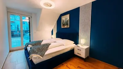 Ein Bett oder Betten in einem Zimmer der Unterkunft Water 7 Cozy Apartment im Herzen von Durlach