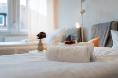 Ein Bett oder Betten in einem Zimmer der Unterkunft 7-Einzelbetten-3-Zimmer-Zentrum-Pforzheim