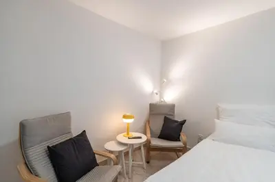 Ein Bett oder Betten in einem Zimmer der Unterkunft 2-Zimmer-Apartment-mit-4-Einzelbetten