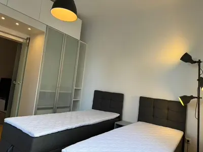 Ein Bett oder Betten in einem Zimmer der Unterkunft 6 Einzelbetten - 4 Zimmer - eigener PARKPLATZ - Balkon