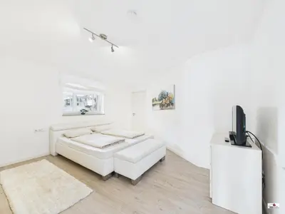 Ein Bett oder Betten in einem Zimmer der Unterkunft Winter Garden Dream Steinheim