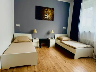 Ein Bett oder Betten in einem Zimmer der Unterkunft Meyben Apartment Mannheim Küche, TV, Waschmachine