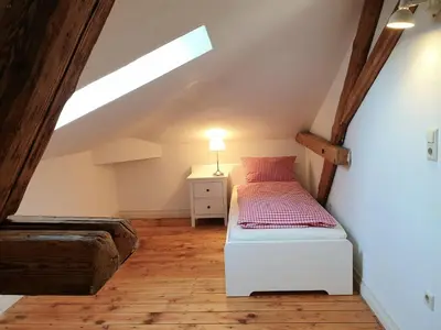 Ein Bett oder Betten in einem Zimmer der Unterkunft Bahnhof Grombach