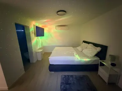 Ein Bett oder Betten in einem Zimmer der Unterkunft Modernes Haus direkt am Rhein
