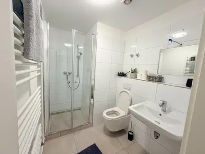 Ein Badezimmer in der Unterkunft Modernes Haus direkt am Rhein