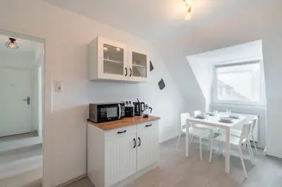 Küche/Küchenzeile in der Unterkunft 2 Zimmer Dachstudio Apartment mit 4 Einzelbetten