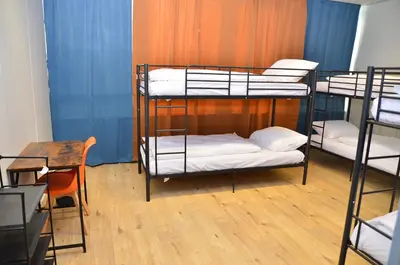 Ein Bett oder Betten in einem Zimmer der Unterkunft Xenon hostels