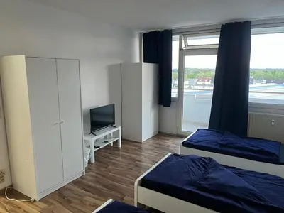 Ein Bett oder Betten in einem Zimmer der Unterkunft Nähe BASF-BG Klinik - MonteurzimmerFirstChoice