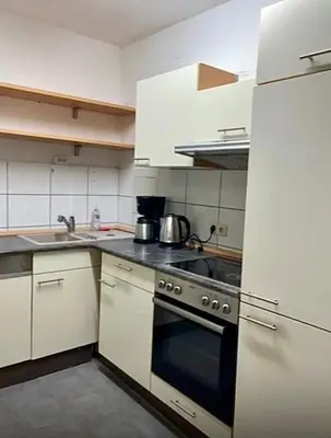 Küche/Küchenzeile in der Unterkunft Nähe BASF-BG Klinik - MonteurzimmerFirstChoice