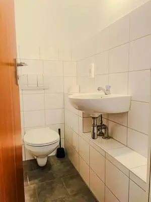 Ein Badezimmer in der Unterkunft Nähe BASF-BG Klinik - MonteurzimmerFirstChoice