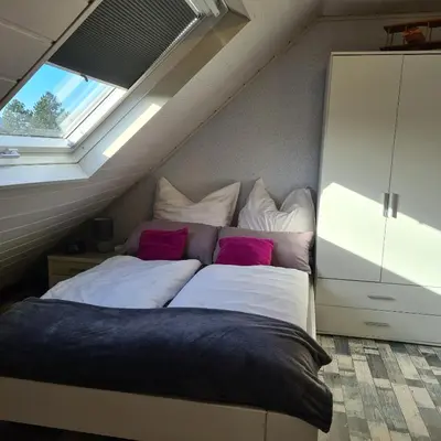 Ein Bett oder Betten in einem Zimmer der Unterkunft ,, Himmelsblick 